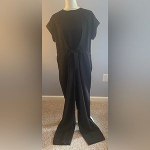 NWOT Women’s jumpsuit in black.